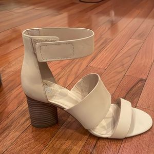 Soft, tan wide heel.